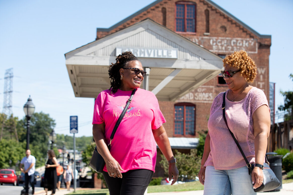 two women walking in downtown farmville