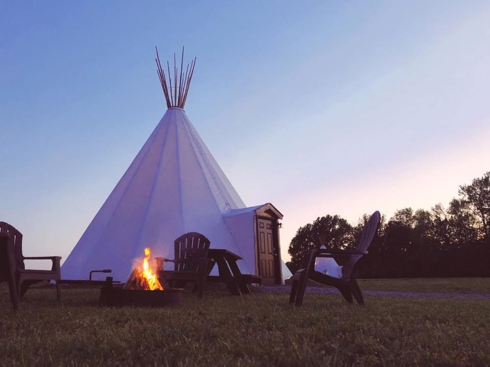 glamping tipi campfire